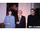 Mom takes a crooked snap of Linda, dad and me at dad's Knighthood ceremony.jpg 28.1K
